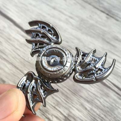 The wings of the Dragon Magic Eye Fidget Spinner Metal Hand Spinner Reduce Stress and Increase Attention Trispinner Stress Wheel